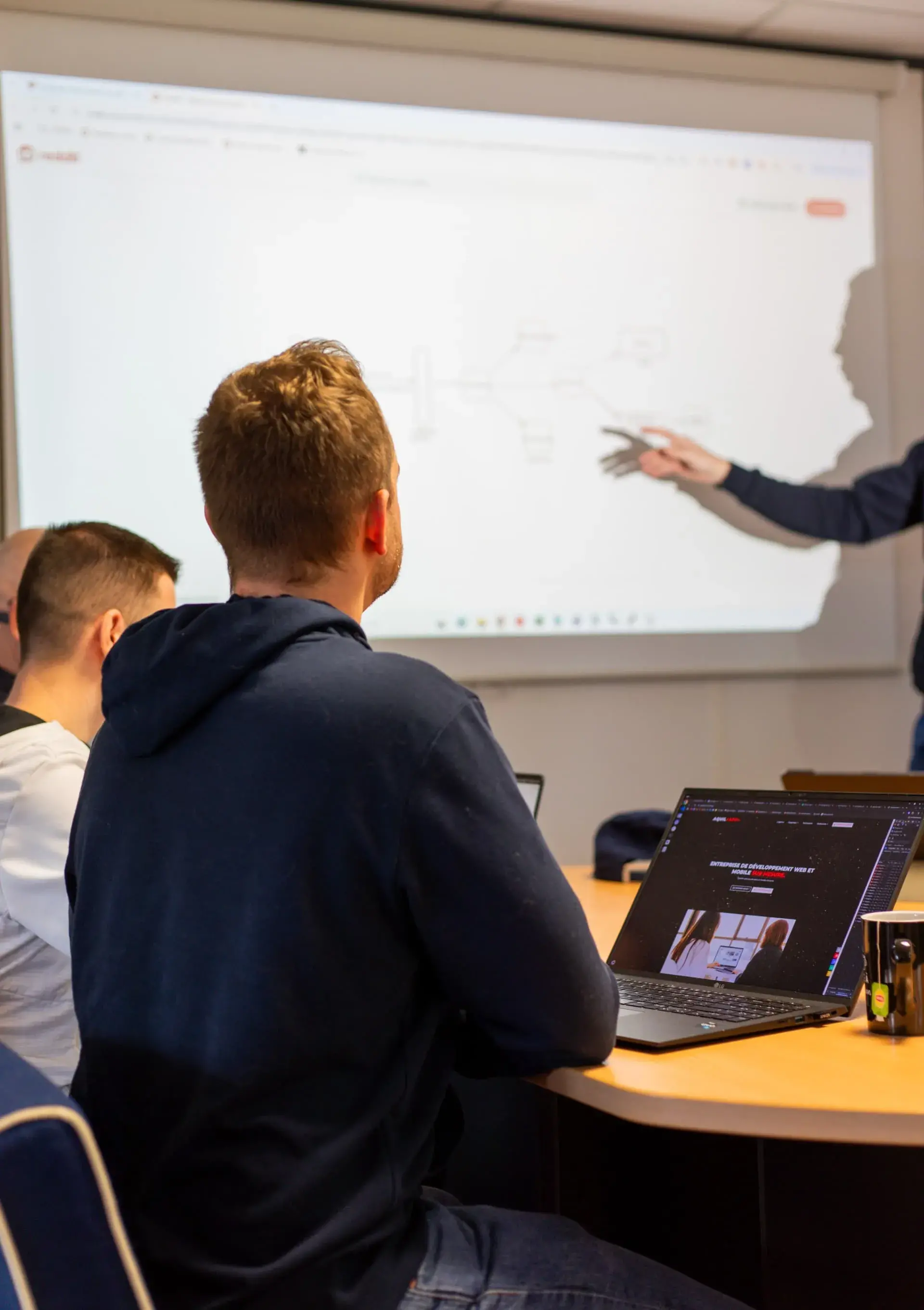 Équipe AquilApp collaborant sur un projet client